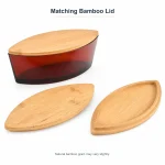 boat-shaped glass candle jar with matching bamboo lid